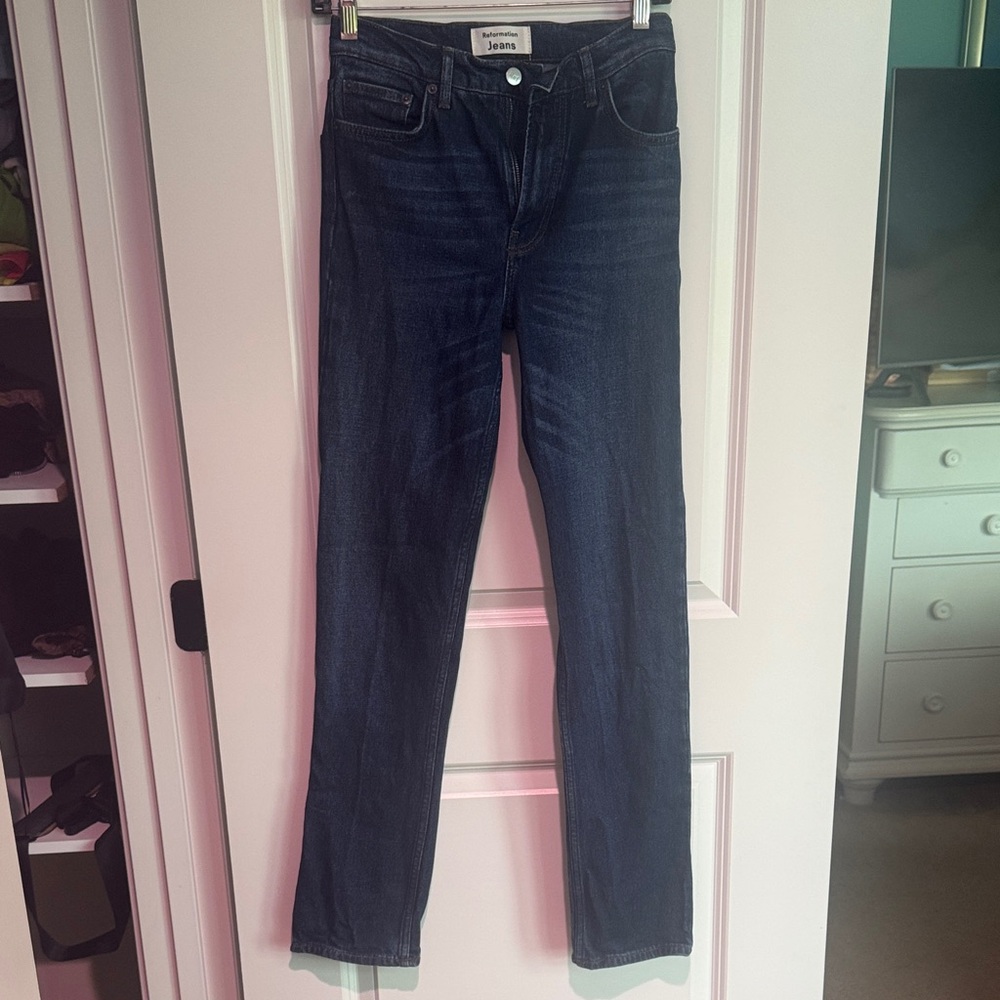 Women’s Reformations dark blue straight leg jeans. Like new. Size 24.